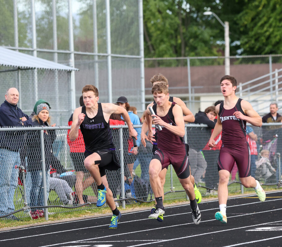 CHS Boys Track. Race showing teams competing on the track.