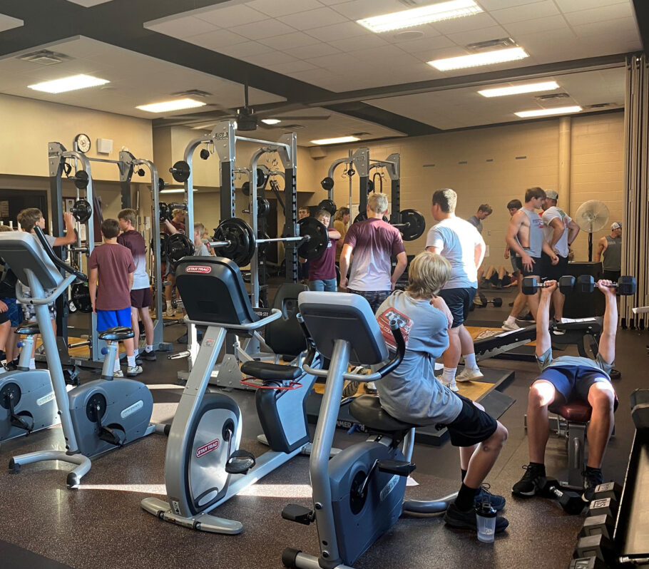 Image of Cashton Sports Fitness Center, showing people using equipment.
