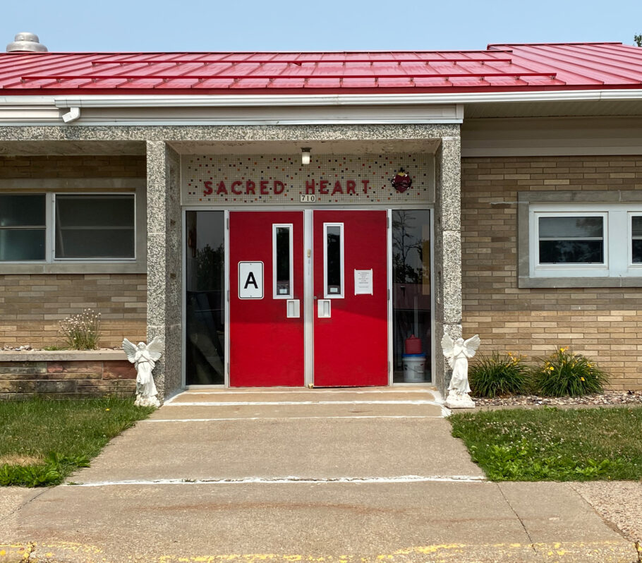 Picture showing front of Sacred Heart School building.