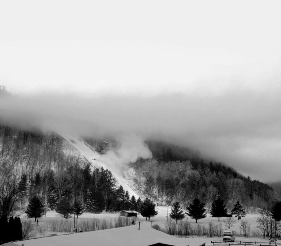 Snowflake Ski Jump. Dramatic black and white image of hill zoomed out.